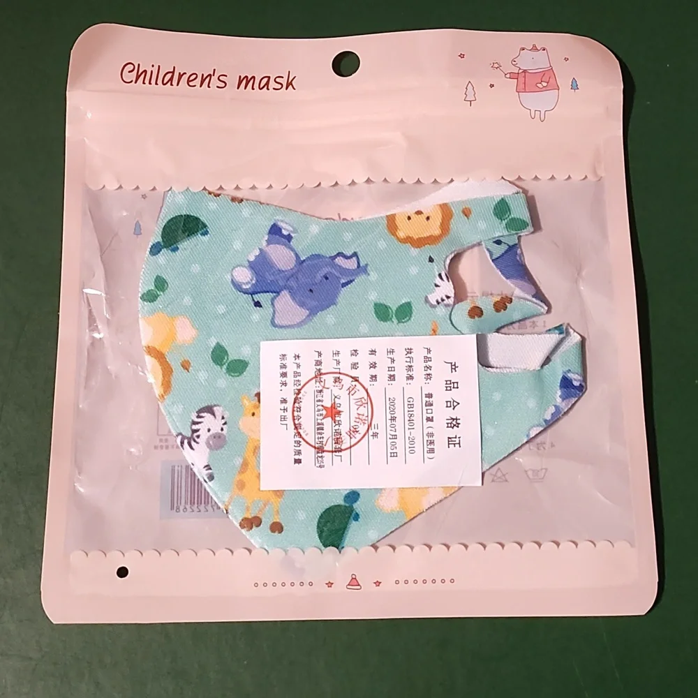 Children's re Usable face mask new in package never opened